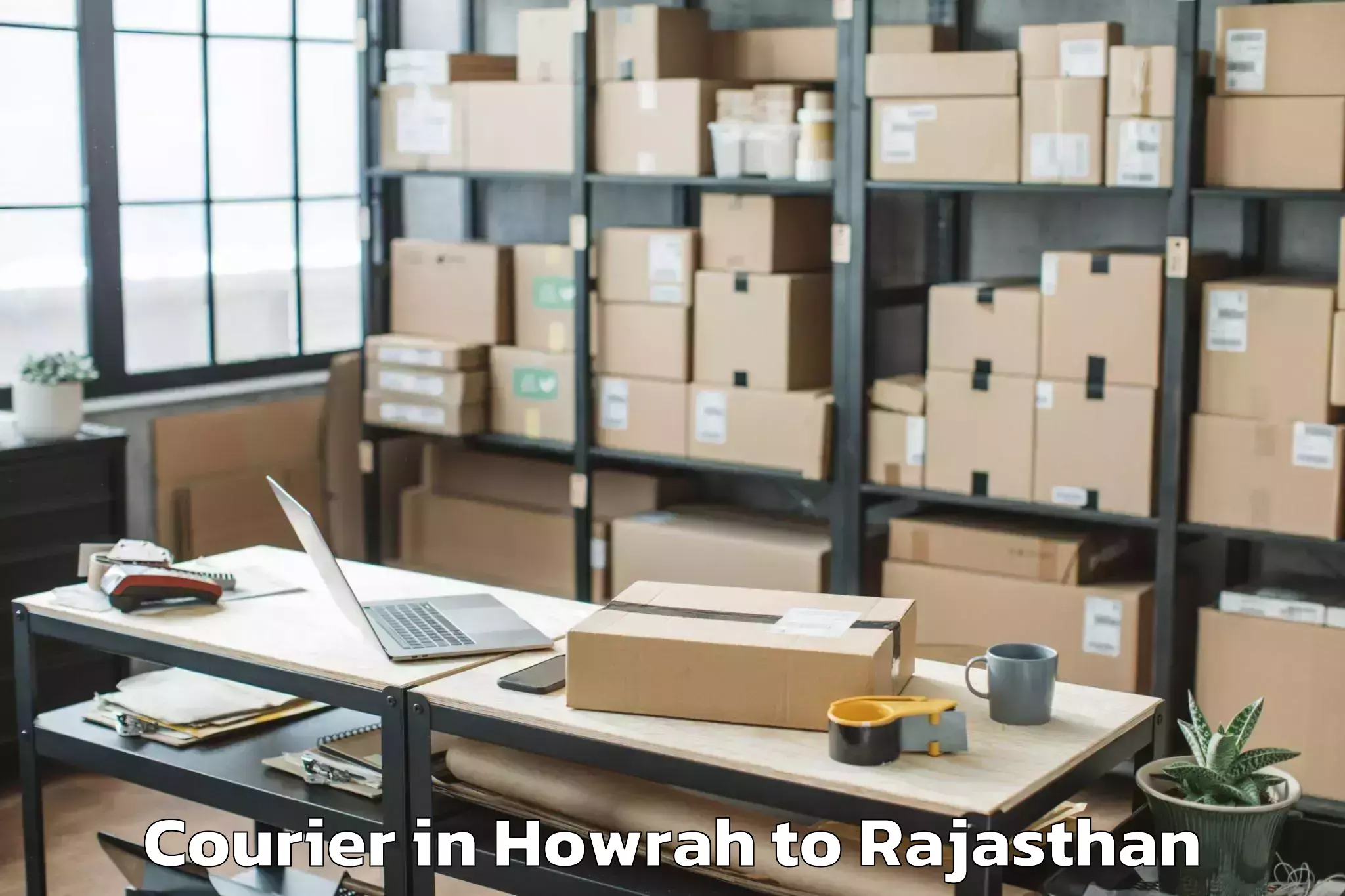 Book Your Howrah to Pipalda Courier Today